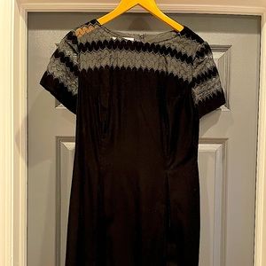 Black Velvet knee length.  Wore once for wedding.